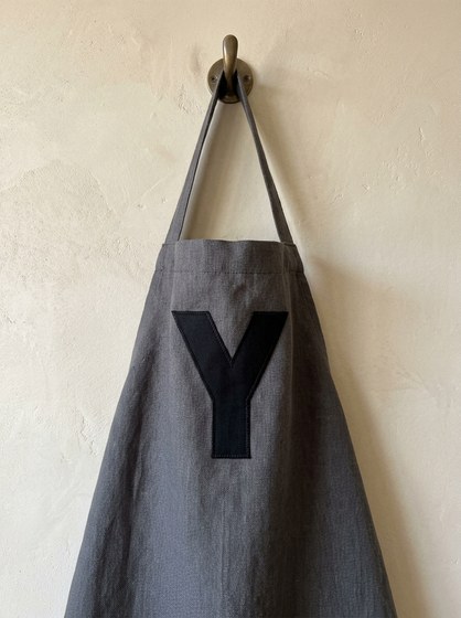 The letter Y in the Miradel font; color: black.